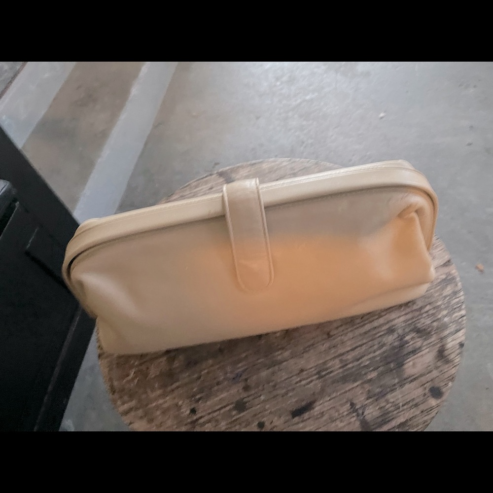 100% Tan leather clutch bag